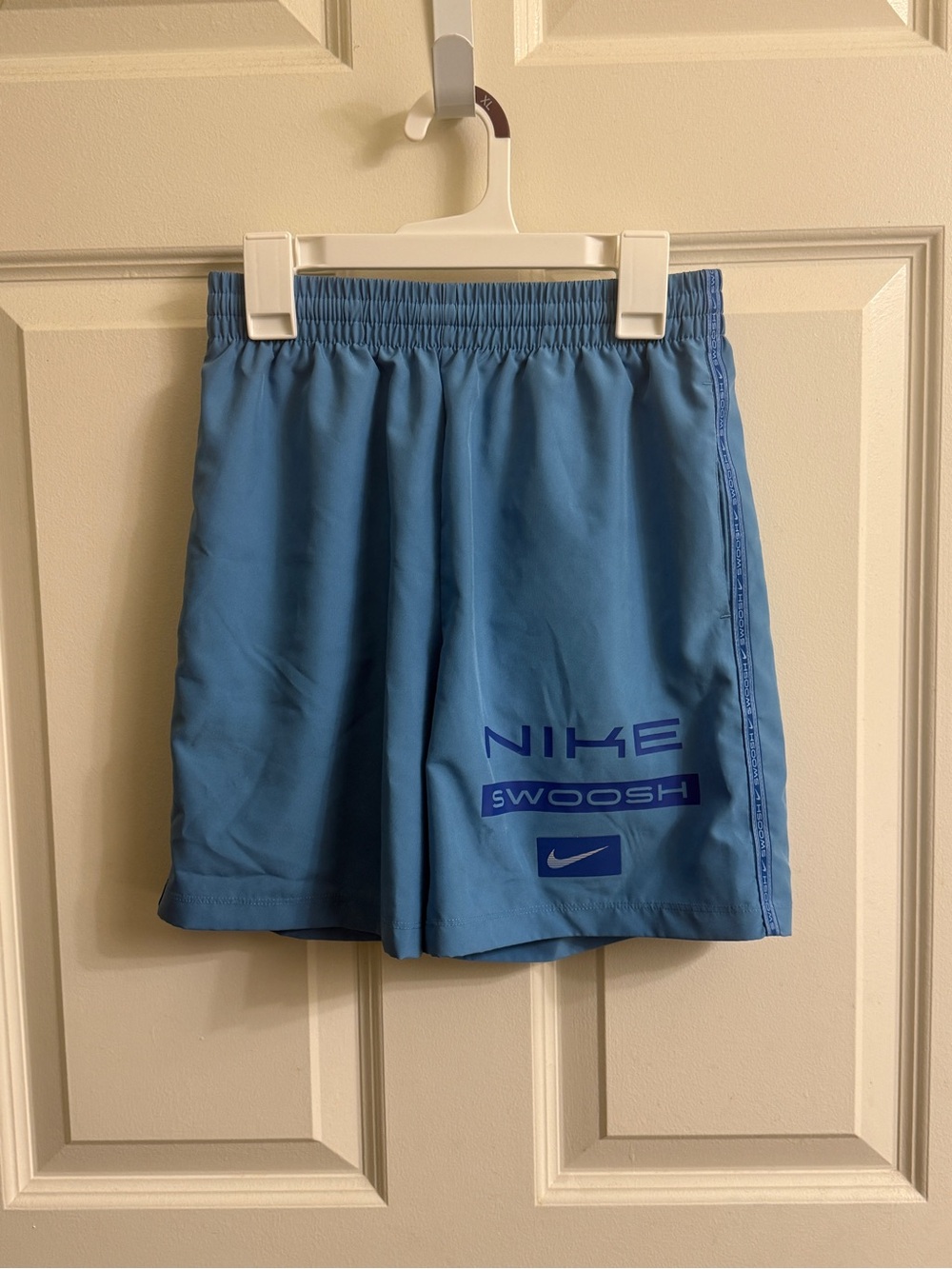 Nike Light Blue Boys' Athletic Shorts with Dark Blue Logos